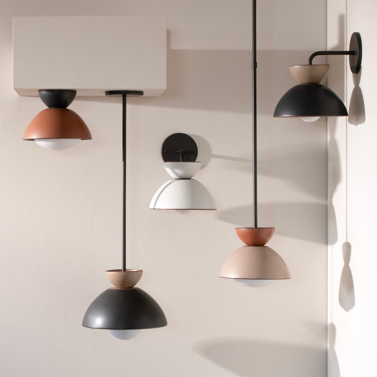 Five light fixtures made from East Fork bowls hung in several manners