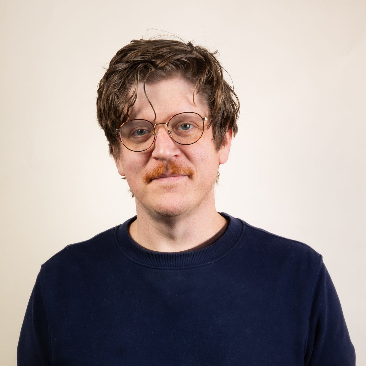 A headshot of Zach R.