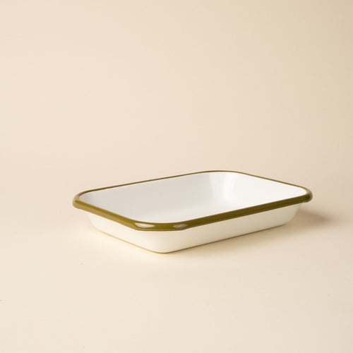 Medium rectangular baking dish in a white color with an olive green rim.
