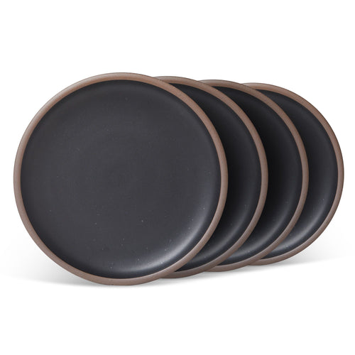 4 dinner sized ceramic plates in a graphite black color featuring iron speckles and an unglazed rim