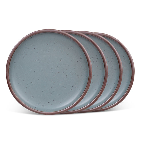 4 dinner sized ceramic plates in a blue-grey color featuring iron speckles and an unglazed rim