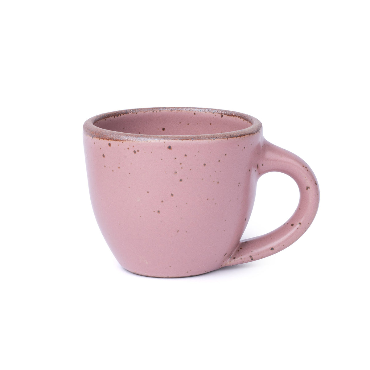 Round stoneware mug with handle, in a dusty mauve pink with iron speckles and an unglazed rim.