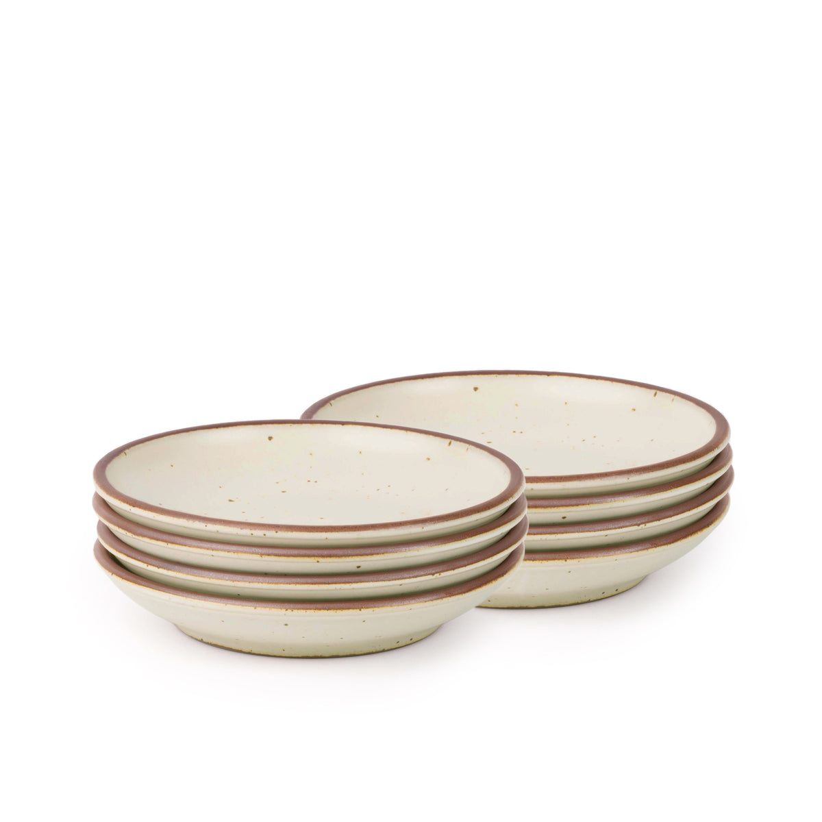 8 small ceramic plates with a curved bowl edge in a warm off-white color featuring iron speckles and an unglazed rim.