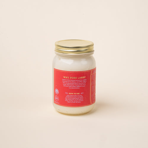Back of a jar of Fond Regenerative Pure & Unflavored Pork Lard on a plain white background.