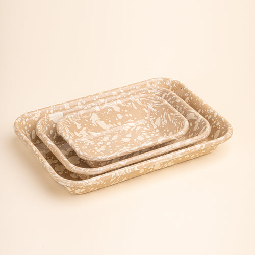3 nesting trio rectangular baking dishes in a neutral tan color with off-white splattered pattern