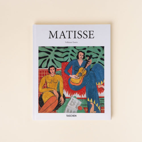 The cover of the book Matisse by Volkmar Essers, featuring Henri Matisse’s colorful painting of two women, one playing a guitar.