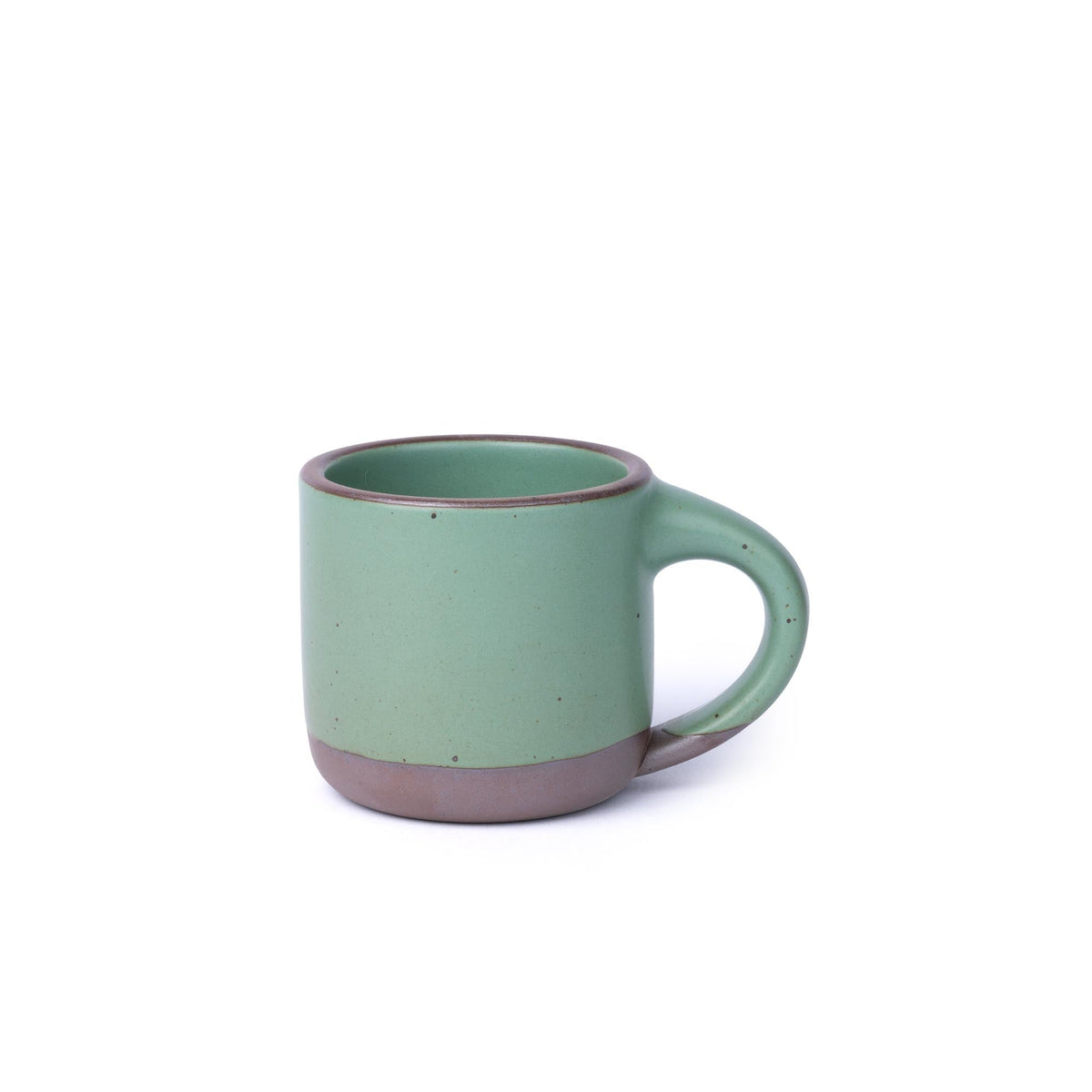 A ceramic mug with a compact form and study handle in a viridian green glaze with a matte finish.