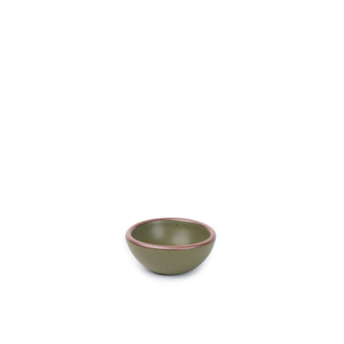 A tiny rounded ceramic bowl in an olive green color featuring iron speckles and an unglazed rim