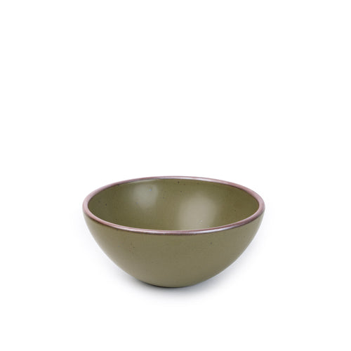 A medium rounded ceramic bowl in an olive green color featuring iron speckles and an unglazed rim