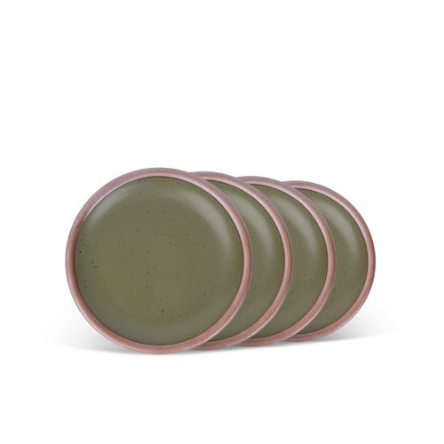 4 dessert sized ceramic plates in an olive green color featuring iron speckles and an unglazed rim.