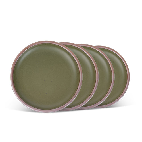 4 medium sized ceramic plates in an olive green color featuring iron speckles and an unglazed rim.