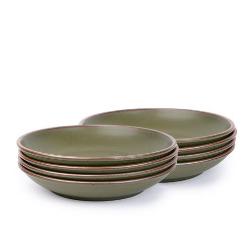 A stack of 8 medium ceramic plates with a curved bowl edge in an olive green color featuring iron speckles and an unglazed rim.