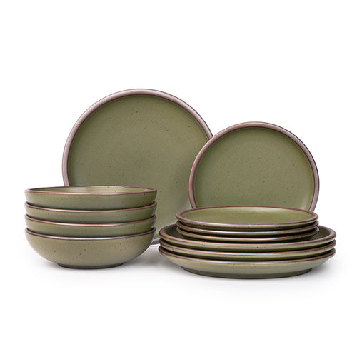 A set of stoneware dinnerware including four dinner plates, four side plates, and four bowls in an olive green color with iron speckles.