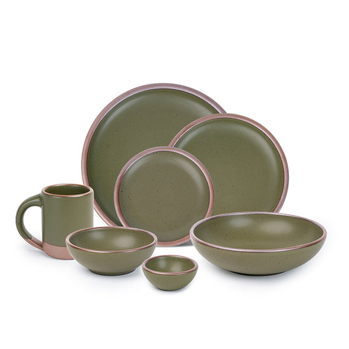 The Mug, bitty bowl, breakfast bowl, everyday bowl, cake plate, side plate and dinner plate paired together in an olive green color featuring iron speckles