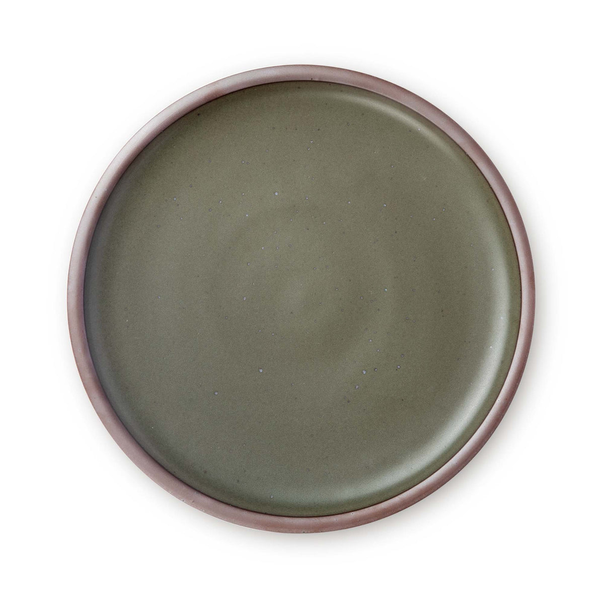 A large ceramic platter in a muted woodsy green color featuring iron speckles and an unglazed rim.