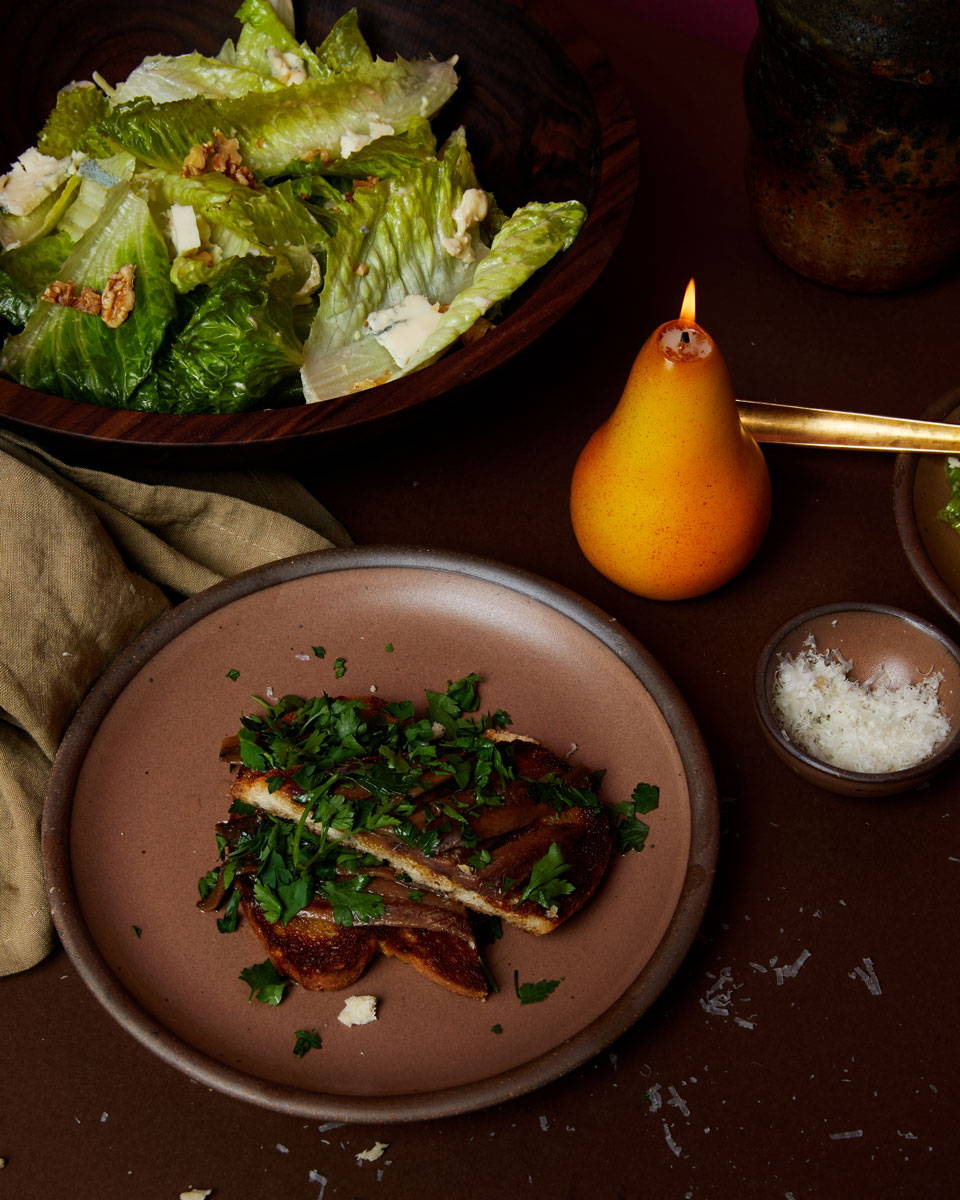 Dinner on a table inspired by Marcella Hazan's Italian cookbook