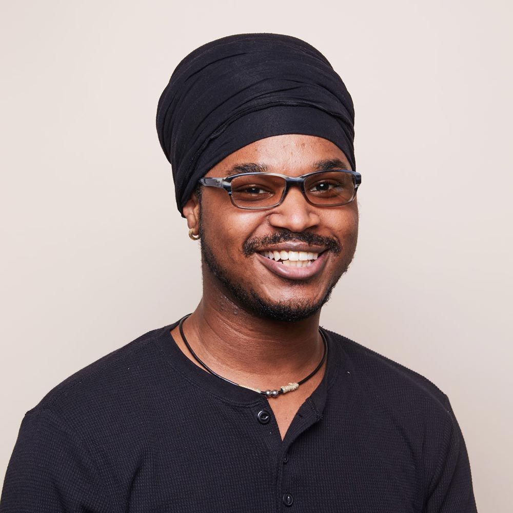 A headshot of Darrin W.
