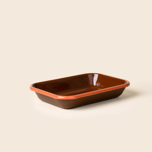 Medium rectangular baking dish in a dark red-brown color with an orange rim.