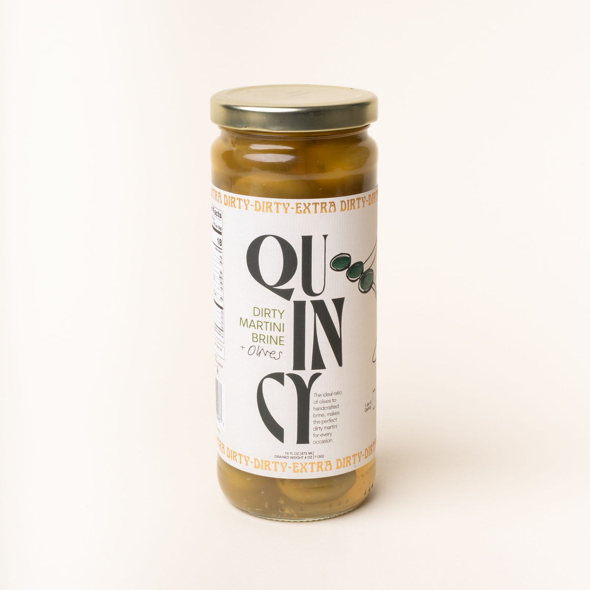 A jar of Quincy Dirty Martini Brine with olives, featuring a white label with bold black text and olive illustrations.