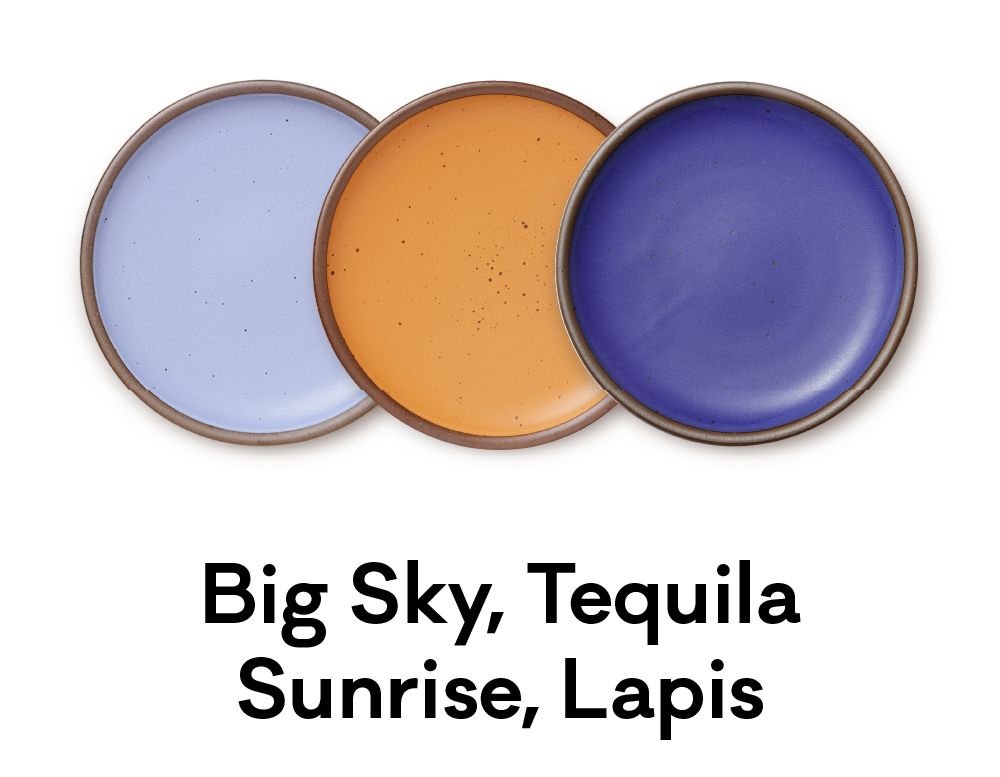 Three plates that are colored in a sky blue, a vibrant orange, and a deep blue are positioned next to each other. Beneath, text reads: 