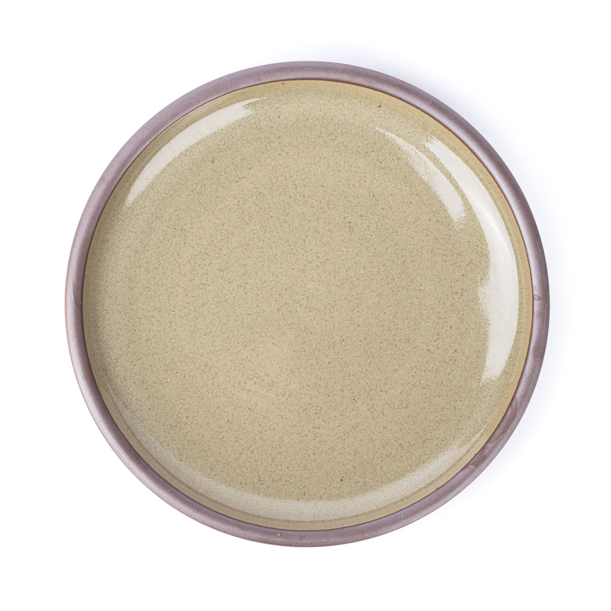 A large ceramic platter in a reflective dappled grey-green color and an unglazed rim.